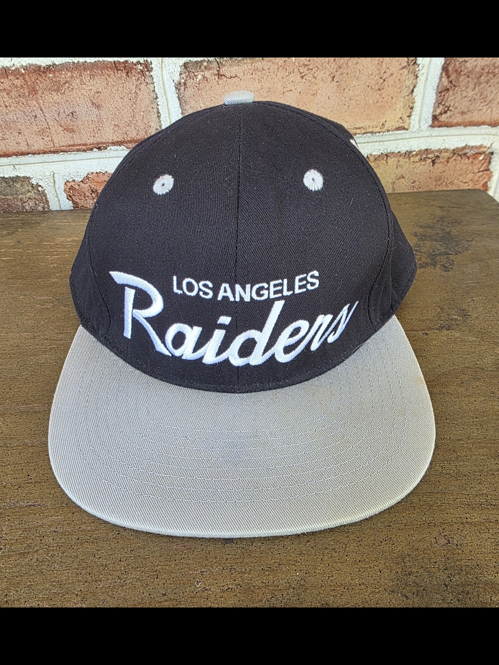 Los Angeles Raiders VINTAGE Script Snapback Hat - Black and Gray